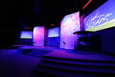 Church interior: another view of the full lighting design for white stage wash, color and motion installed by HiFi Doc