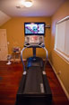 Exercise on the treadmill while watching TV or any of the integrated devices as shown here in this local area home